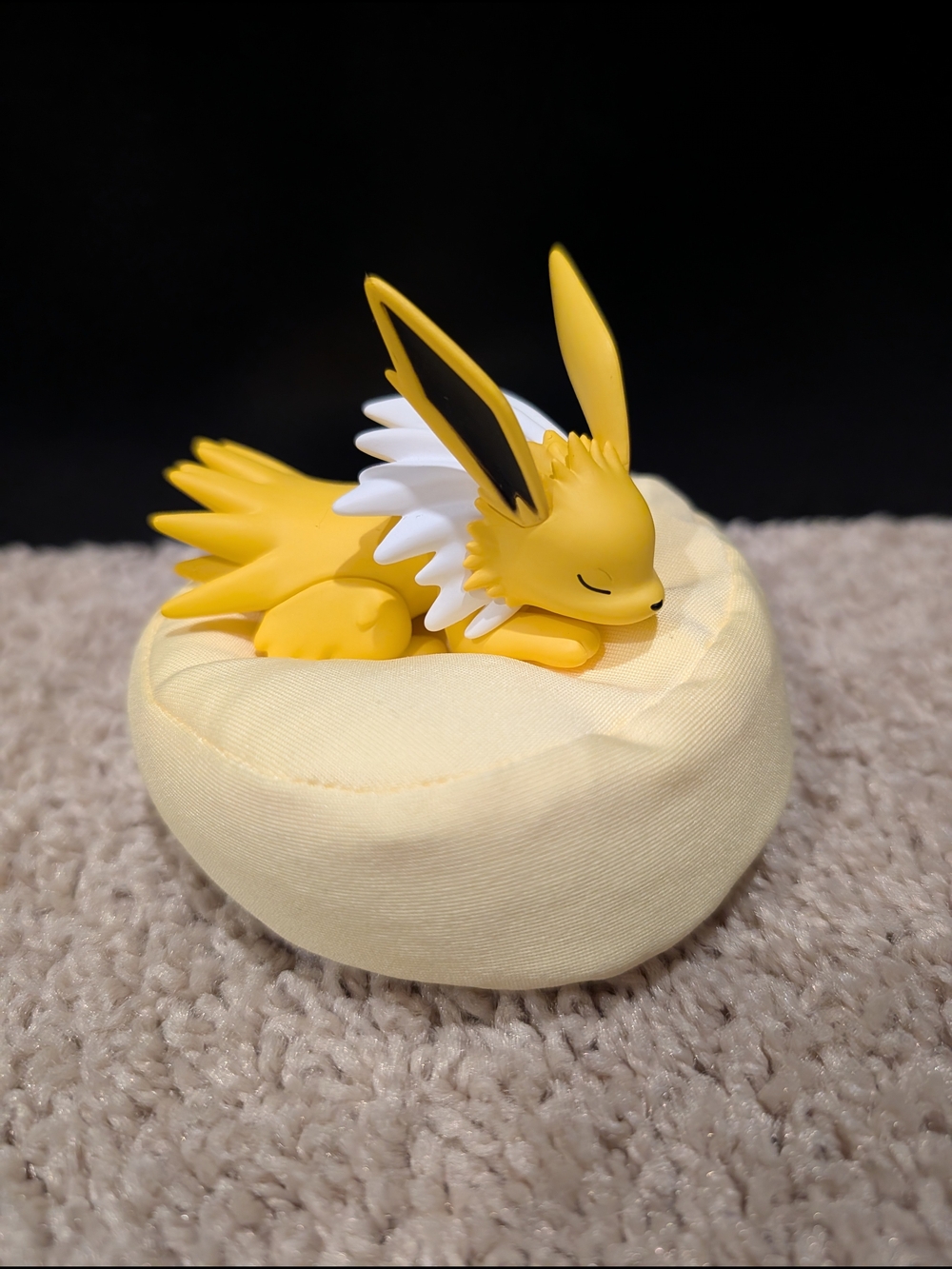 Yellow Jolteon Figurine on Soft Yellow Cushion - Collectible Pokemon Blind Box